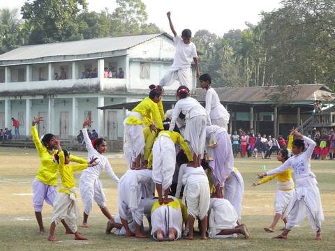 Students forming a human pyramid